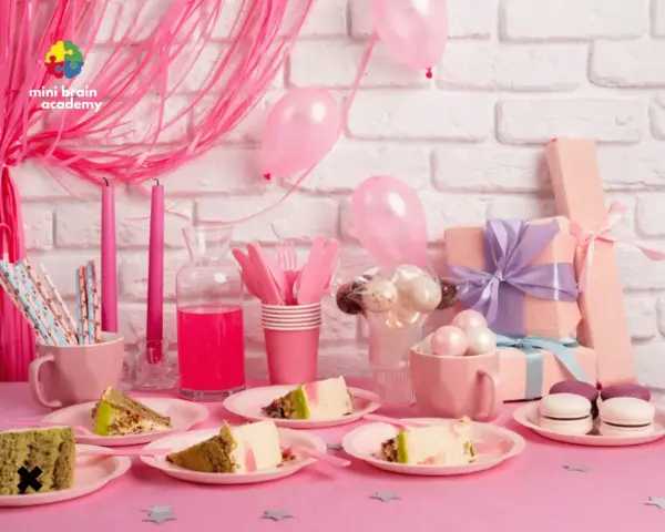 Różowy motyw na urodziny: torty, prezenty, balony i słodkości.