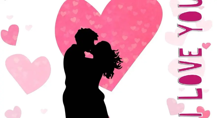 Para uczczenia światowy dzień miłości, całuje się na tle różowych serc. Napis "I LOVE YOU" dopełnia romantyczną scenę.